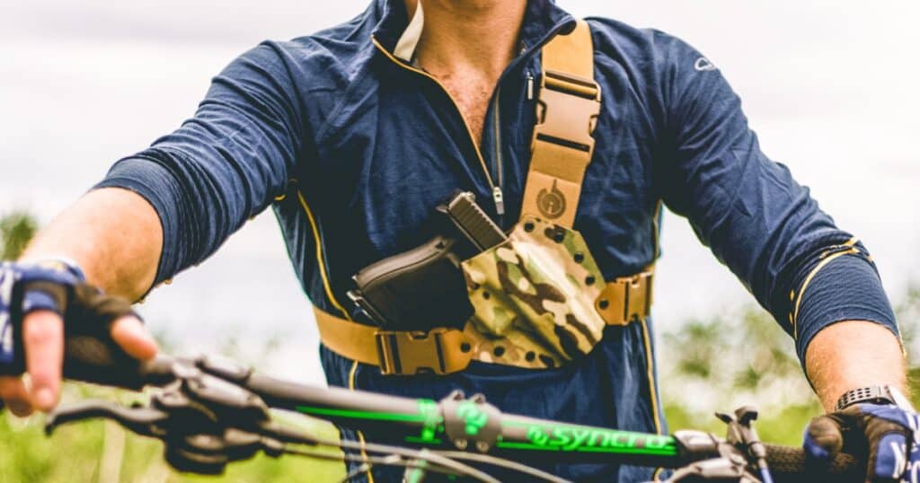 close up of a Gunfighters Inc chest holder on man on his mountain bike