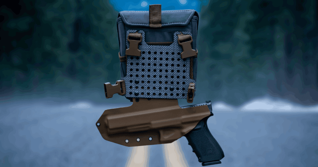 The Bino Link Holster by GunfightersINC against a road backdrop.