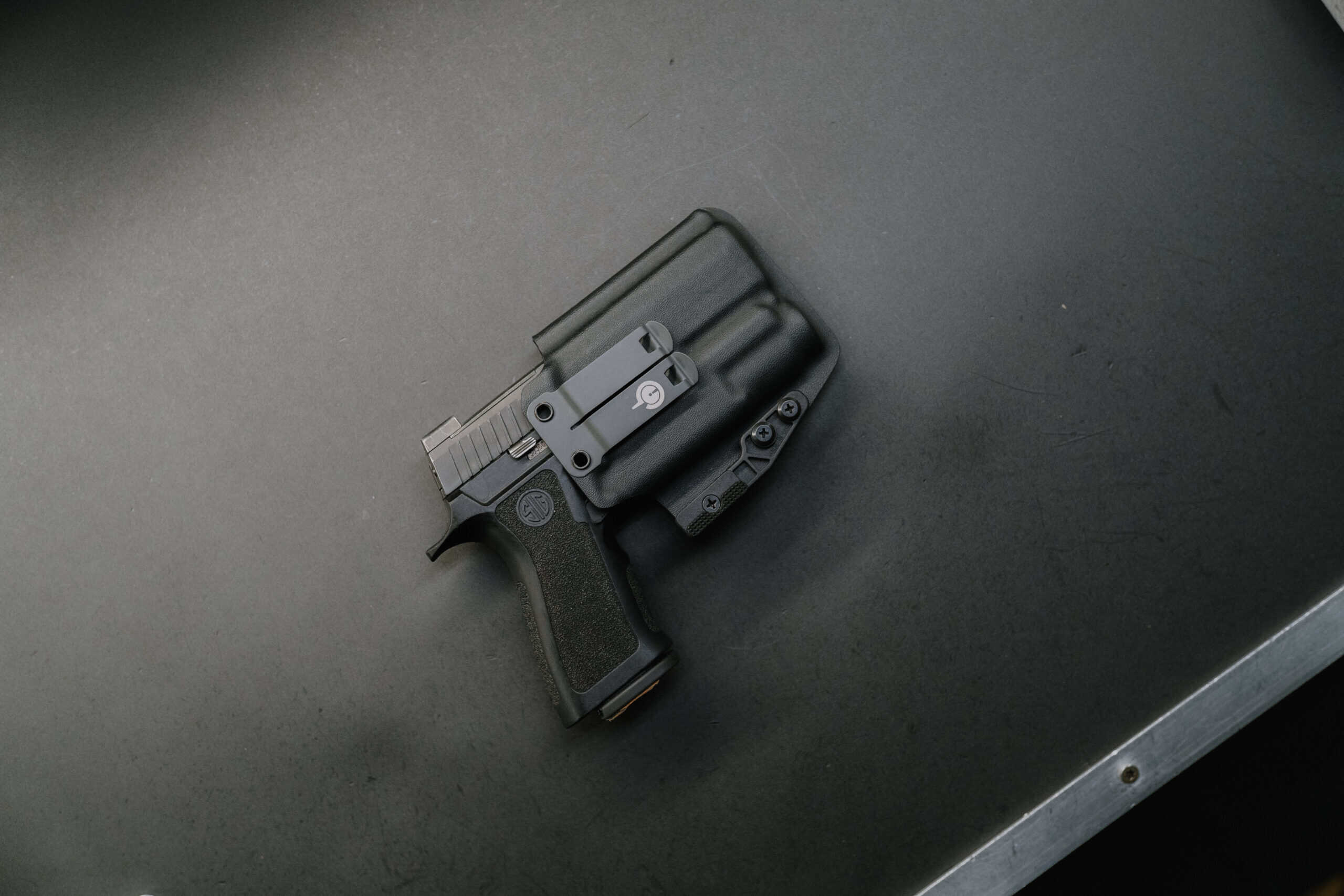 Pistol Holstered in a Ready to Ship Light Bearing Wraith Holster