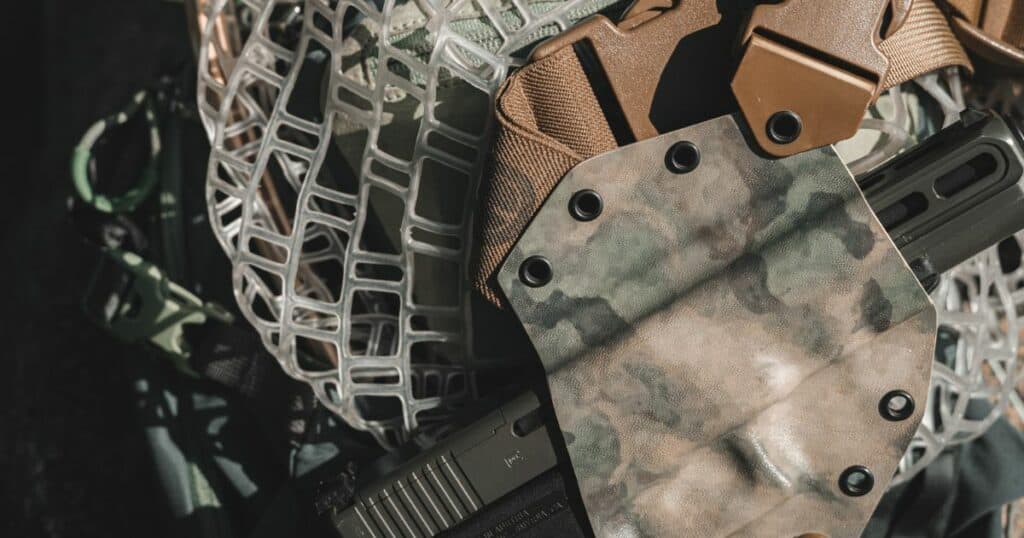 A close-up of a GunfightersINC kydex holster.